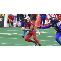Jacksonville Sharks receiver Cody Saul makes a move against the Columbus Lions